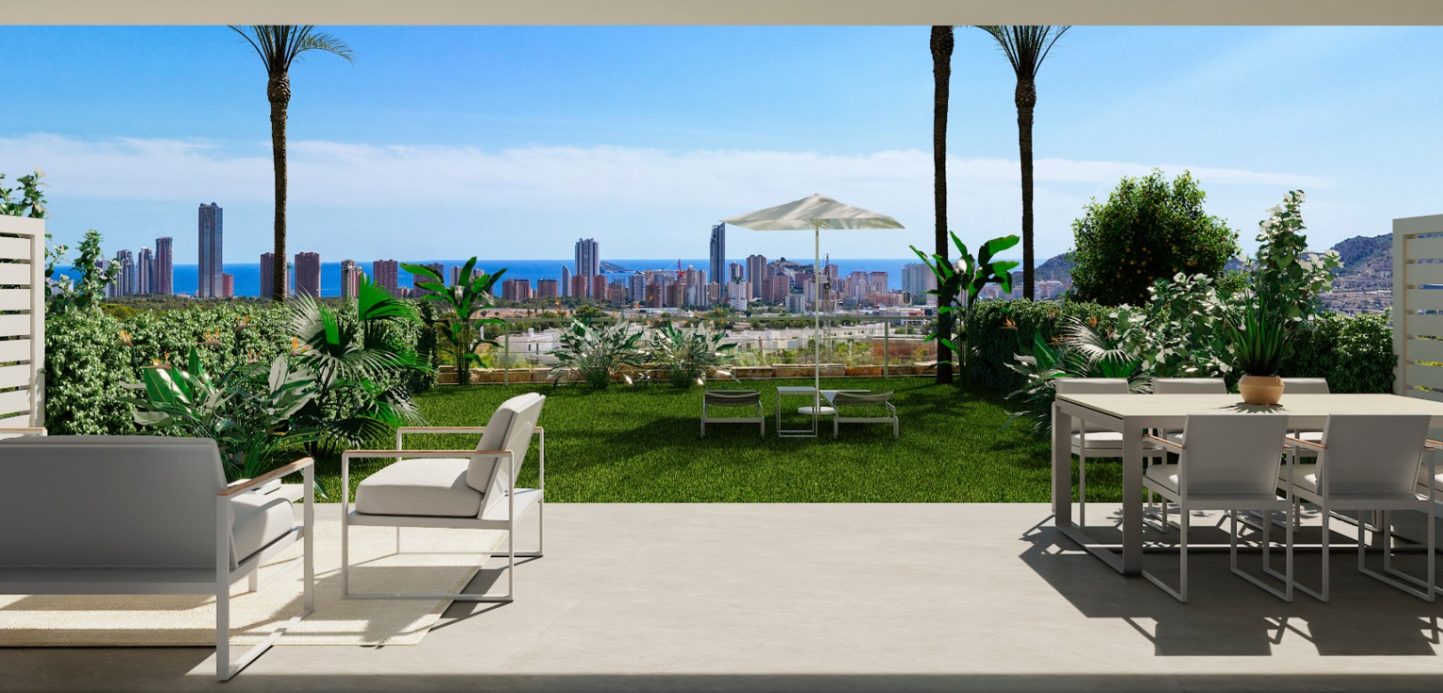 Preciosa planta baja con gran jardín y con vistas al mar .